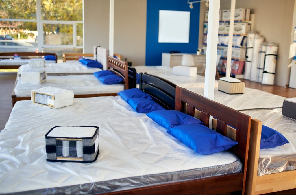 Mattress store with beds set up for display